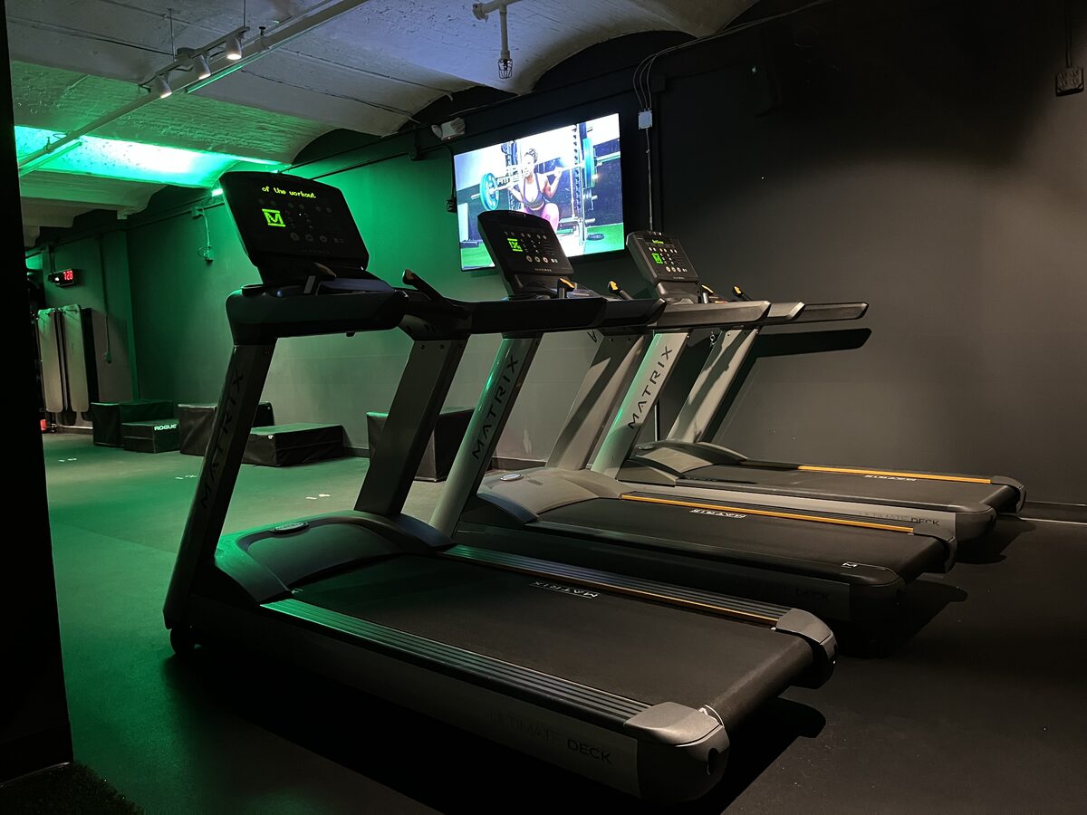Row of Matrix treadmills in the cardio zone